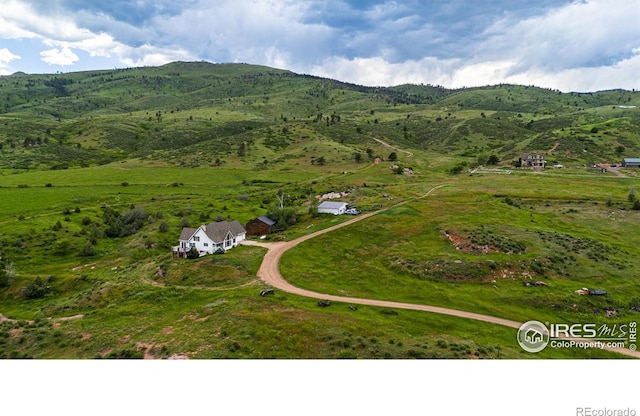 12711 Buckhorn Rd, Loveland, CO 80538 - aerial view of sparsely populated area featuring a mountain backdrop