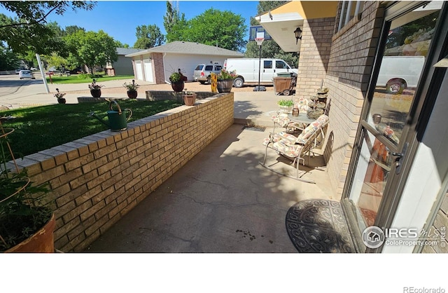 420 Applewood St, Brush, CO 80723 - view of patio / terrace featuring an outdoor structure