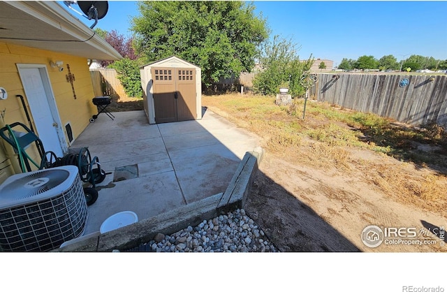 420 Applewood St, Brush, CO 80723 - fenced backyard featuring a shed and a patio area