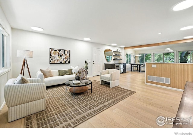 2545 Woodstock Pl, Boulder, CO 80305 - living area featuring wood finished floors and recessed lighting