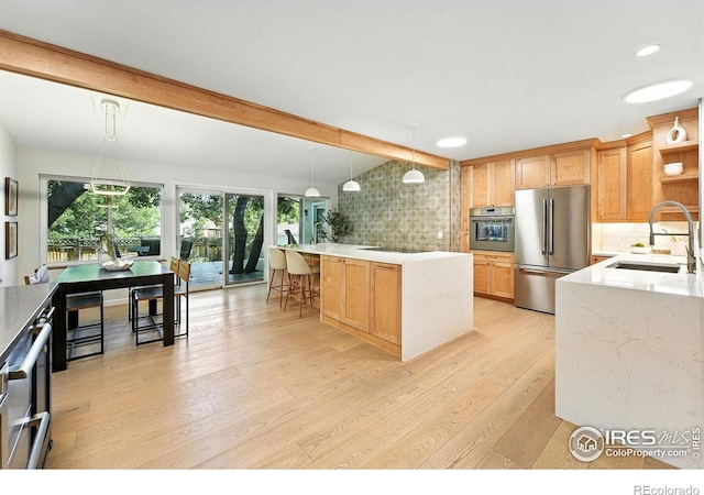 2545 Woodstock Pl, Boulder, CO 80305 - kitchen featuring plenty of natural light, light wood-type flooring, backsplash, stainless steel appliances, and beam ceiling