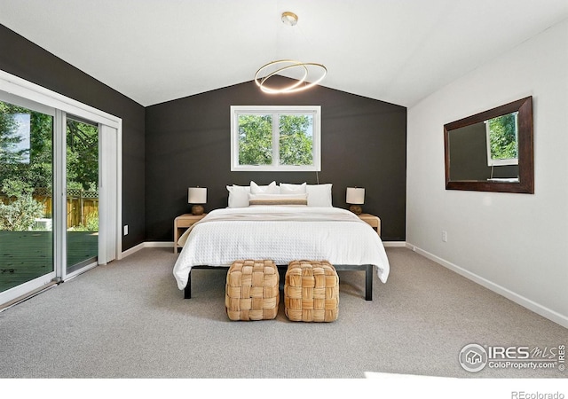 2545 Woodstock Pl, Boulder, CO 80305 - carpeted bedroom featuring access to exterior, multiple windows, and lofted ceiling