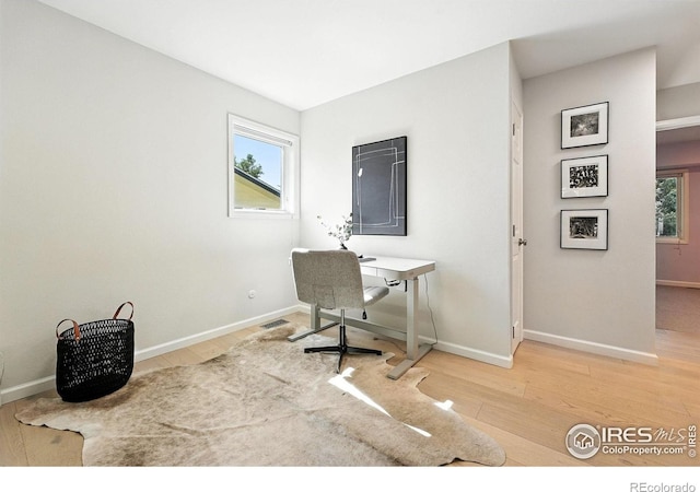 2545 Woodstock Pl, Boulder, CO 80305 - home office with wood finished floors