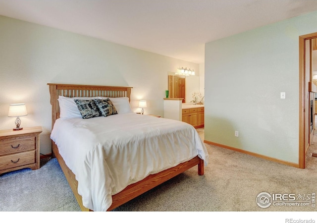 4500 Seneca St Unit 11, Fort Collins, CO 80526 - bedroom featuring light carpet and ensuite bathroom