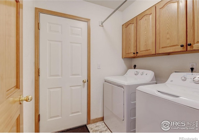 4500 Seneca St Unit 11, Fort Collins, CO 80526 - laundry area featuring independent washer and dryer and cabinet space