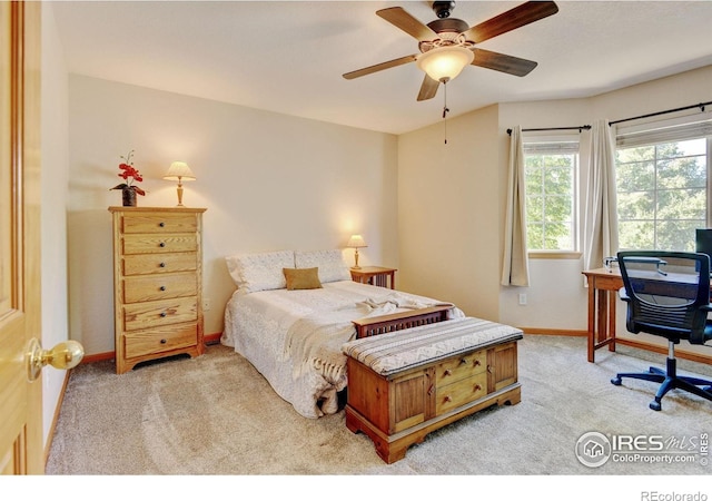 4500 Seneca St Unit 11, Fort Collins, CO 80526 - bedroom with light carpet and a ceiling fan