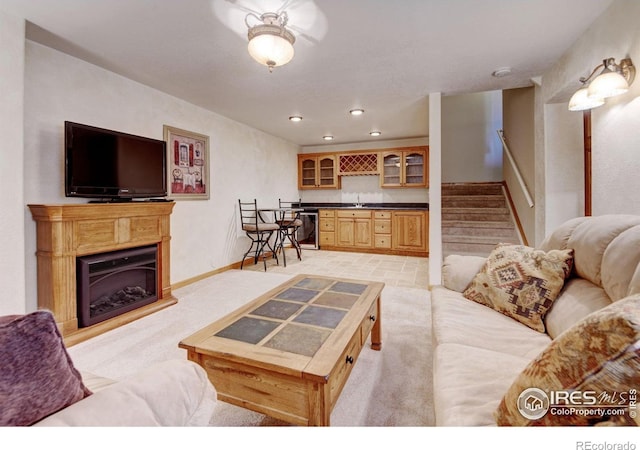 4500 Seneca St Unit 11, Fort Collins, CO 80526 - living area featuring wet bar, recessed lighting, stairs, and a fireplace