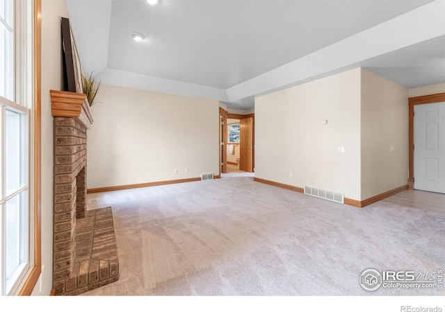3822 W 11th St Unit 35, Greeley, CO 80634 - unfurnished living room with carpet floors and a raised ceiling