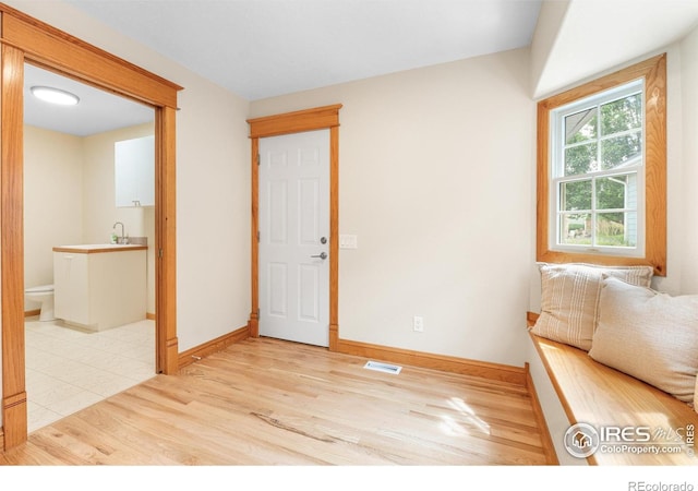 3822 W 11th St Unit 35, Greeley, CO 80634 - entrance foyer with wood finished floors and baseboards