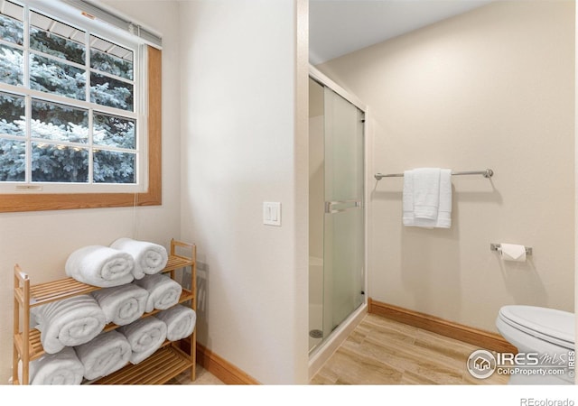 3822 W 11th St Unit 35, Greeley, CO 80634 - full bath featuring a stall shower and wood finished floors