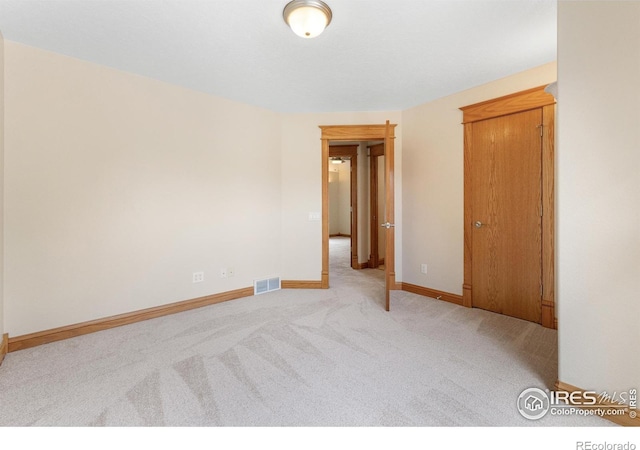 3822 W 11th St Unit 35, Greeley, CO 80634 - carpeted spare room with baseboards