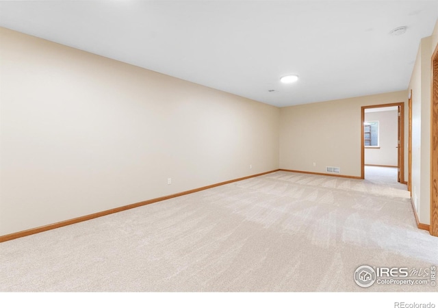 3822 W 11th St Unit 35, Greeley, CO 80634 - spare room featuring light colored carpet and recessed lighting