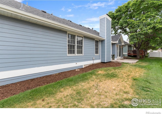 3822 W 11th St Unit 35, Greeley, CO 80634 - view of grassy yard with a patio