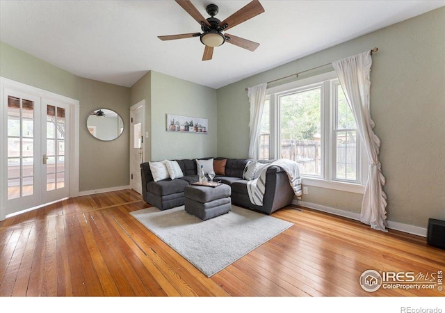511 E Prospect Rd, Fort Collins, CO 80525 - living area with hardwood / wood-style floors, a ceiling fan, and french doors