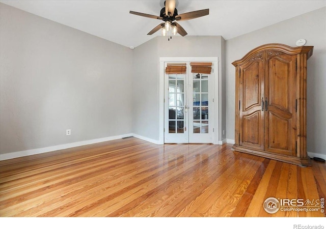 511 E Prospect Rd, Fort Collins, CO 80525 - unfurnished room featuring french doors, ceiling fan, light wood-style flooring, and vaulted ceiling