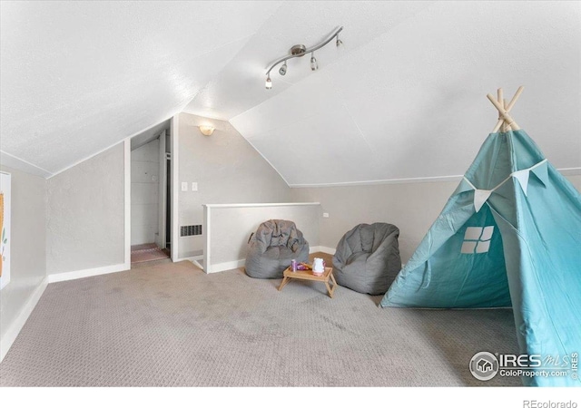 511 E Prospect Rd, Fort Collins, CO 80525 - sitting room featuring vaulted ceiling and carpet flooring