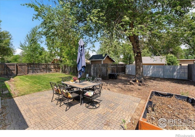 511 E Prospect Rd, Fort Collins, CO 80525 - fenced backyard with a patio and outdoor dining area