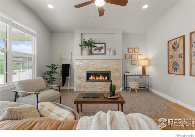 1062 Mt Columbia Dr, Severance, CO 80550 - living area featuring carpet flooring, ceiling fan, a stone fireplace, and recessed lighting