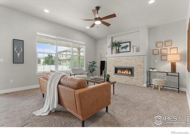1062 Mt Columbia Dr, Severance, CO 80550 - living room with carpet, ceiling fan, a glass covered fireplace, recessed lighting, and vaulted ceiling