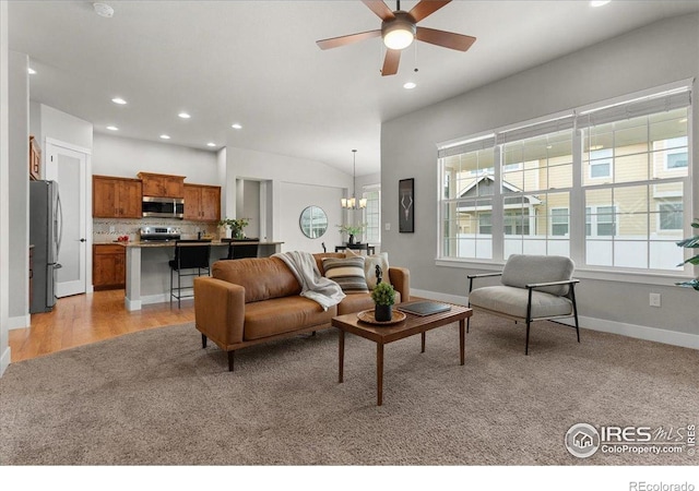 1062 Mt Columbia Dr, Severance, CO 80550 - living room featuring a chandelier, recessed lighting, a ceiling fan, lofted ceiling, and light wood finished floors