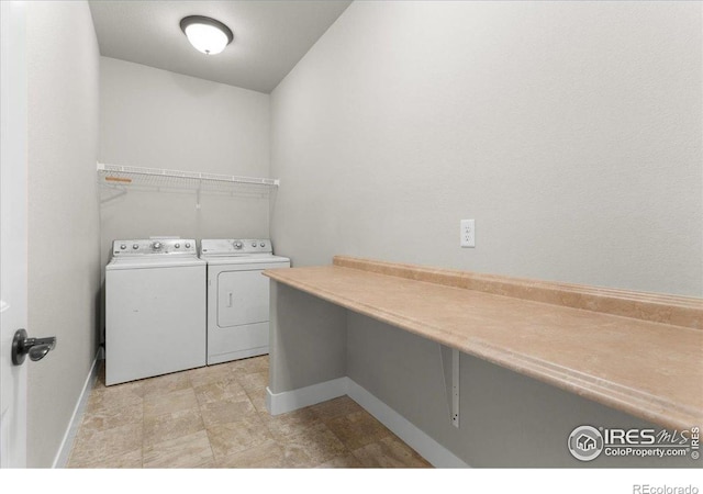 1062 Mt Columbia Dr, Severance, CO 80550 - laundry room with separate washer and dryer and baseboards