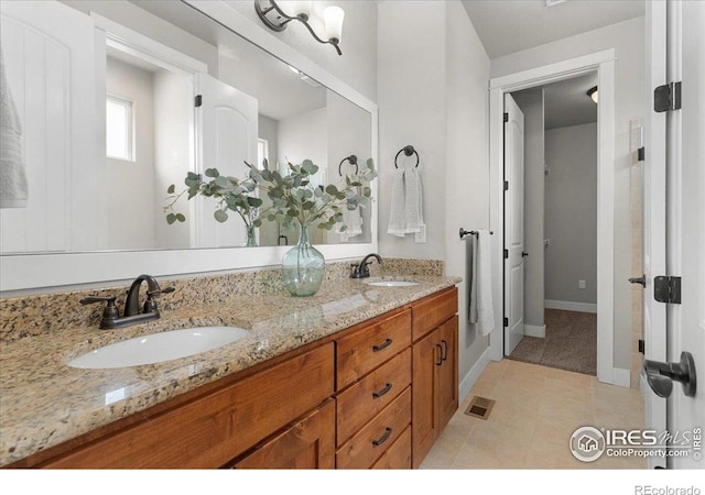 1062 Mt Columbia Dr, Severance, CO 80550 - full bath featuring double vanity and tile patterned flooring