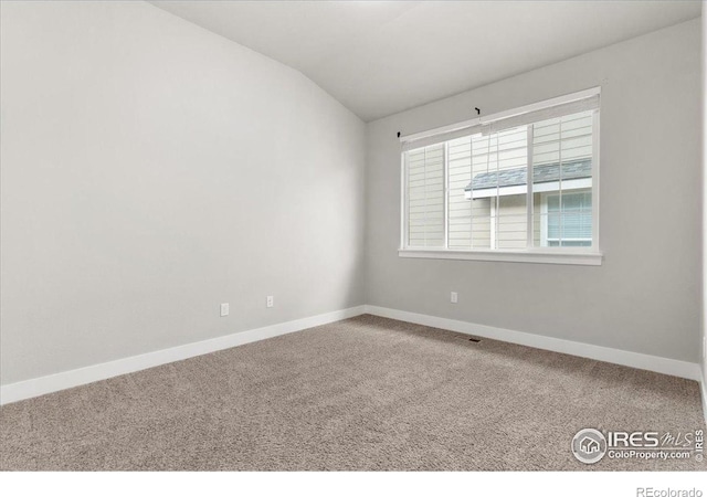 1062 Mt Columbia Dr, Severance, CO 80550 - carpeted spare room featuring lofted ceiling and baseboards