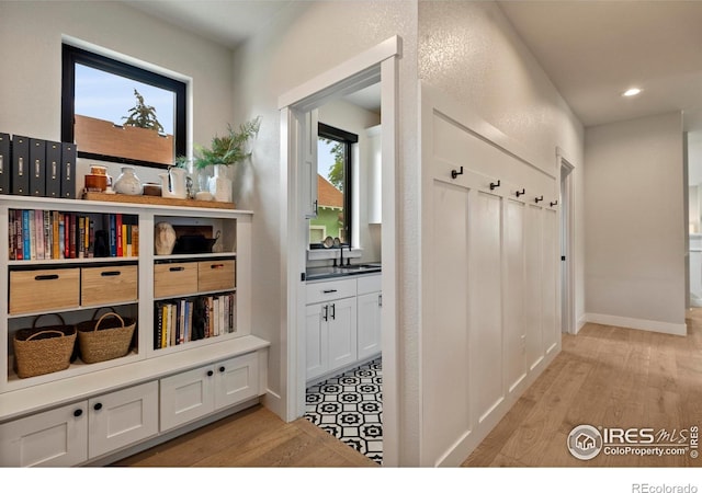 4306 Dixon St, Timnath, CO 80547 - mudroom with light wood-style floors and recessed lighting