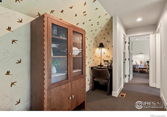 4306 Dixon St, Timnath, CO 80547 - foyer entrance featuring dark carpet and wallpapered walls
