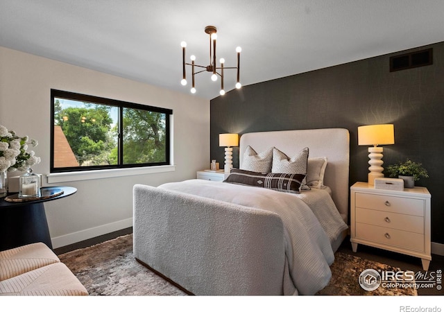 4306 Dixon St, Timnath, CO 80547 - bedroom with a chandelier and baseboards