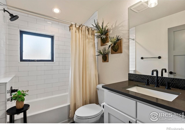 4306 Dixon St, Timnath, CO 80547 - bathroom with vanity, shower / tub combo with curtain, a textured wall, and recessed lighting