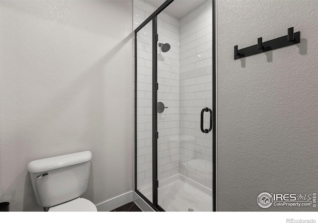 4306 Dixon St, Timnath, CO 80547 - full bathroom with a shower stall and toilet