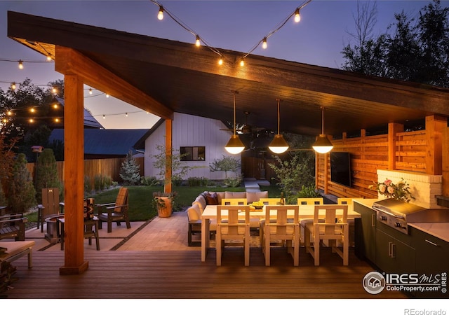 4306 Dixon St, Timnath, CO 80547 - deck at twilight with outdoor dining space and a grill