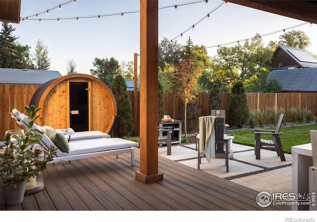 4306 Dixon St, Timnath, CO 80547 - wooden deck with a fenced backyard and a patio