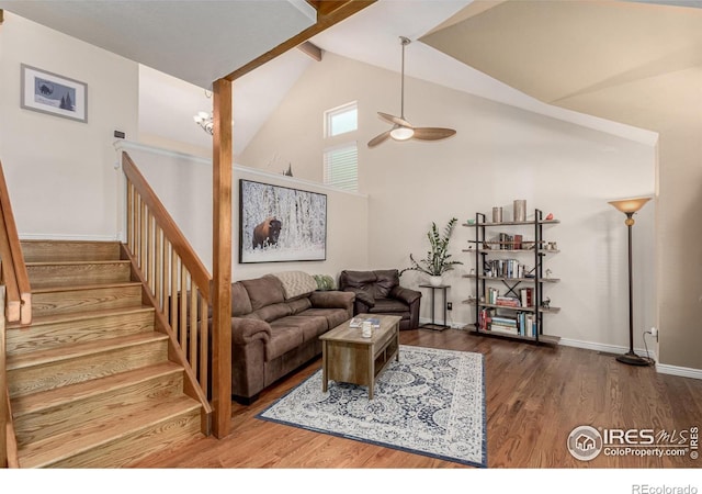 11417 King Way, Westminster, CO 80031 - living room featuring a ceiling fan, beamed ceiling, wood finished floors, and high vaulted ceiling