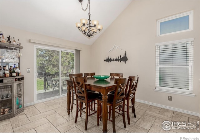 11417 King Way, Westminster, CO 80031 - dining area with a chandelier and high vaulted ceiling