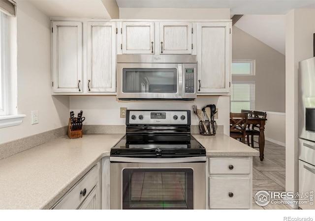 11417 King Way, Westminster, CO 80031 - kitchen featuring stainless steel appliances and light countertops