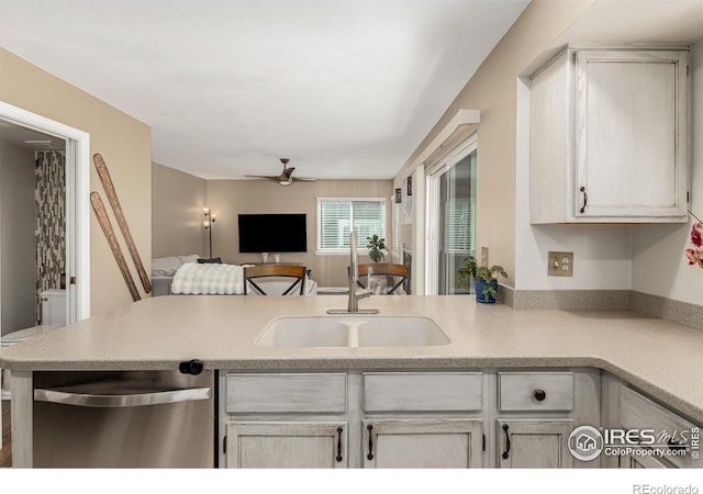 11417 King Way, Westminster, CO 80031 - kitchen with dishwasher, open floor plan, ceiling fan, a peninsula, and light countertops