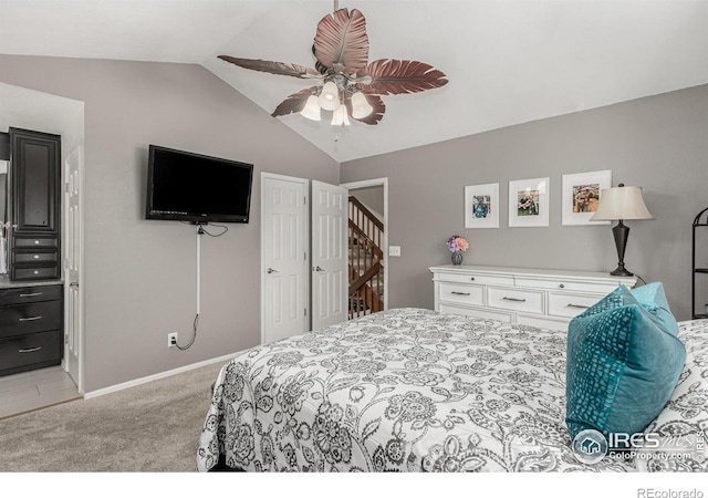 11417 King Way, Westminster, CO 80031 - bedroom with lofted ceiling, light colored carpet, and ceiling fan