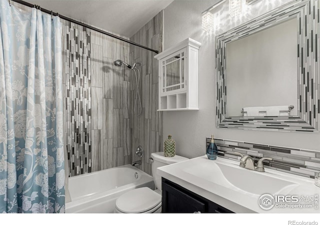 11417 King Way, Westminster, CO 80031 - full bath with vanity, shower / tub combo, a textured wall, and decorative backsplash