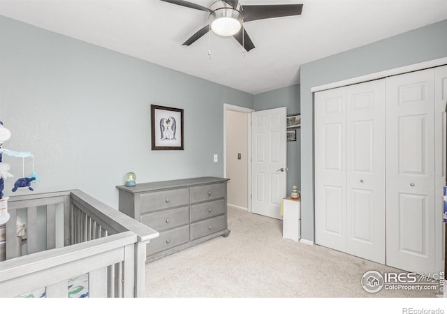 11417 King Way, Westminster, CO 80031 - carpeted bedroom with a closet, a ceiling fan, and a crib