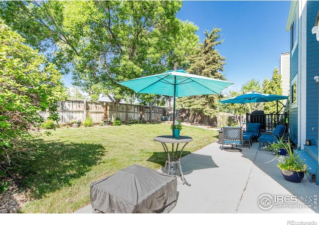 11417 King Way, Westminster, CO 80031 - fenced backyard featuring a patio