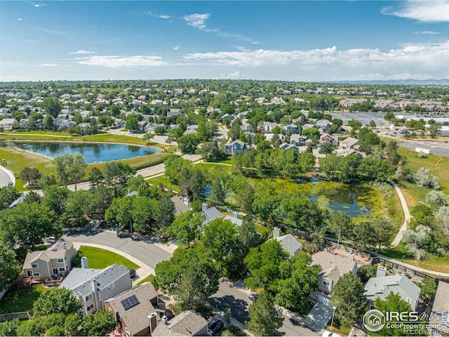 11417 King Way, Westminster, CO 80031 - aerial perspective of suburban area featuring a large body of water