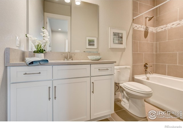 full bathroom with vanity, toilet, and tiled shower / bath combo