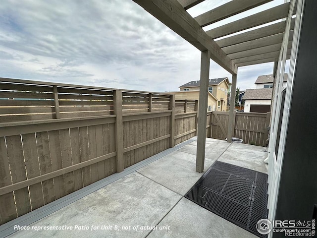 view of patio featuring a pergola