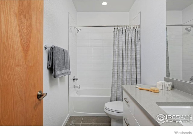 full bathroom with vanity, toilet, tile patterned floors, and shower / bath combo with shower curtain