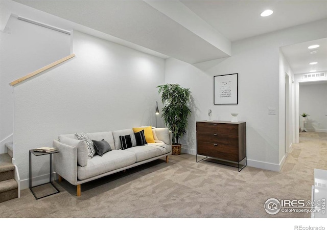 living area with visible vents, recessed lighting, carpet, baseboards, and stairs