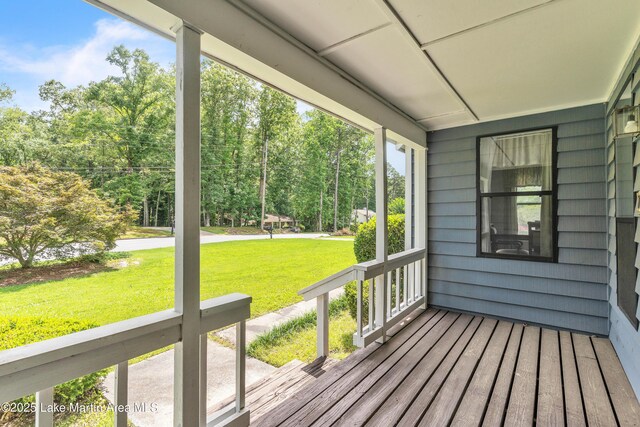 226 Auburn Dr, Alexander City, AL 35010 - porch with a yard and view of scattered trees