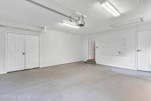 226 Auburn Dr, Alexander City, AL 35010 - garage with a garage door opener