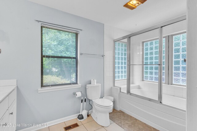 226 Auburn Dr, Alexander City, AL 35010 - full bathroom featuring vanity, enclosed tub / shower combo, and tile patterned flooring